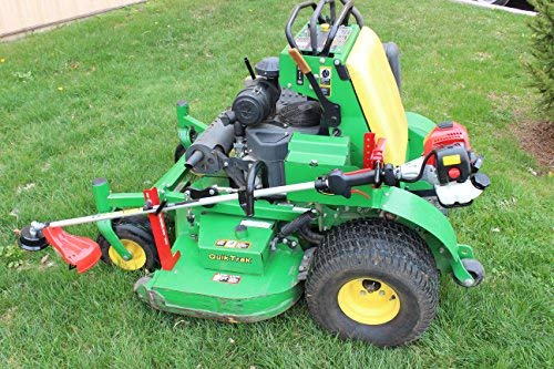 Jungle Jim's Mower Trimmer Rack secured on a ZTR for quick access during mowing