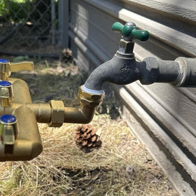 JUNHOME 90-degree hose elbow relieves hose strain during watering tasks.