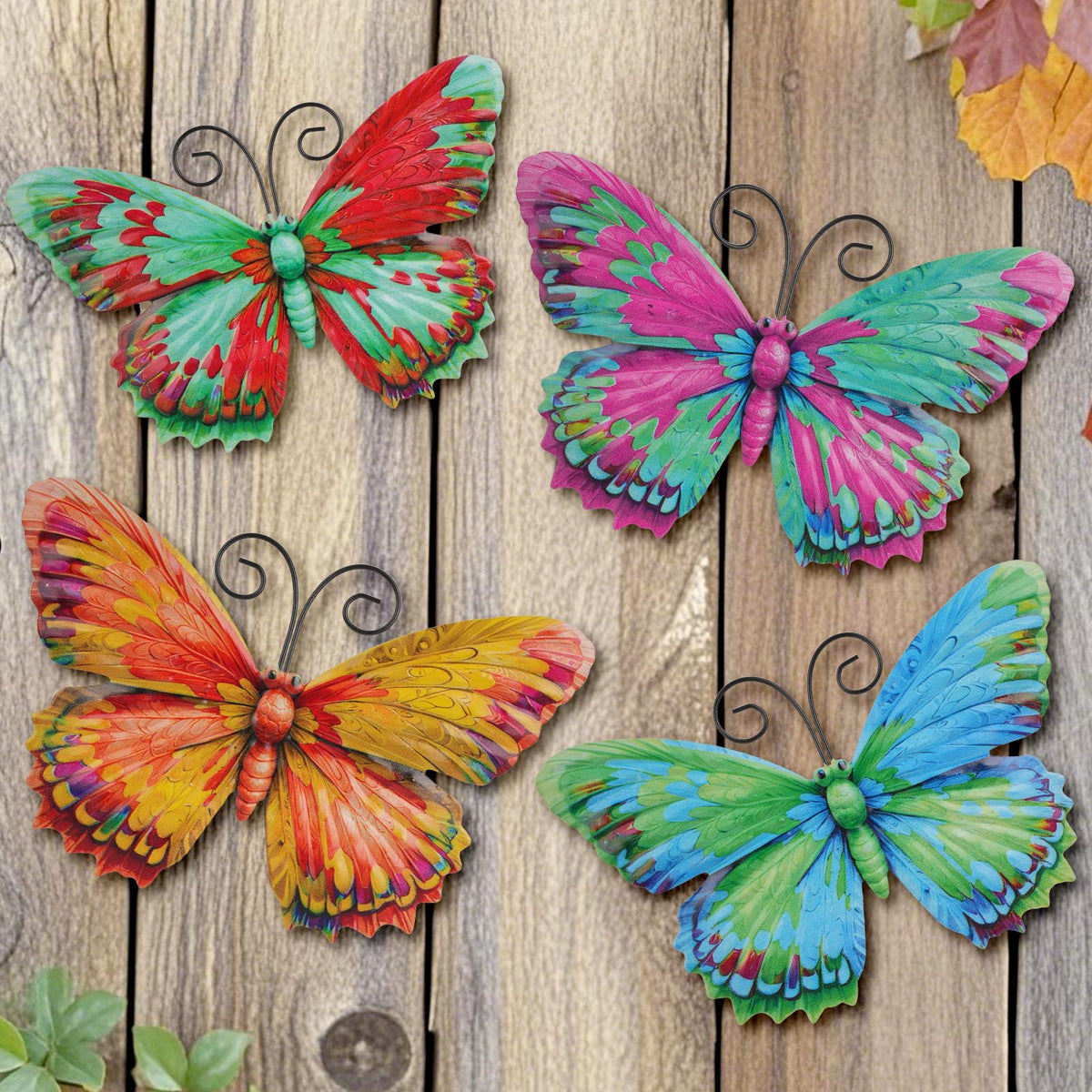 Junware red butterfly wall art adds vibrant outdoor color.