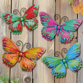 Junware red butterfly wall art adds vibrant outdoor color.