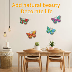 Junware butterfly wall art closeup shows hand-painted wind-dance details.