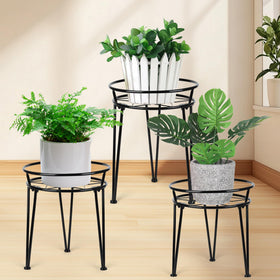Jvtoo metal plant stand large pedestal for outdoor pots enhances garden display.