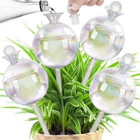 JXWENBYX 17 oz iridescent glass watering globe in soil delivers steady hydration.