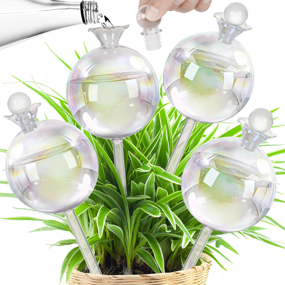 JXWENBYX 17 oz iridescent glass watering globe in soil delivers steady hydration.