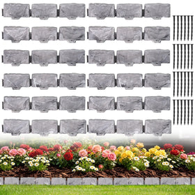 JYINCPED faux stone landscape edging borders a flower bed.
