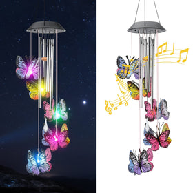 KAHACIYO Solar Butterfly Wind Chimes in sunlit garden, soft illumination enhances evening ambience.