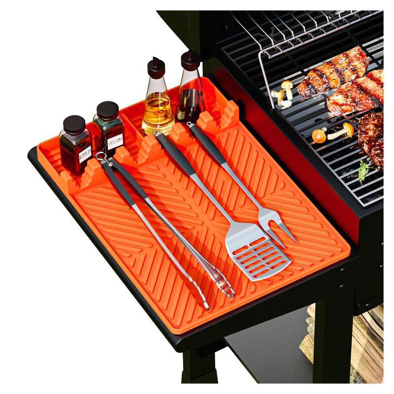 Kaisiking silicone grill mat on the side shelf keeps tools organized within reach.