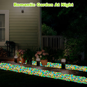 Kaiyuan Dynasty glow pebbles outlining a driveway border for safety and ambiance.