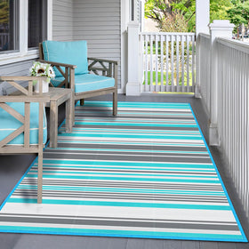 Kalafun outdoor rug adds colorful stripes to balcony or porch.