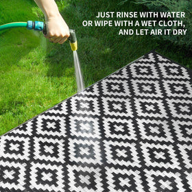 Kalafun portable rug packs flat for travel to campsites or RV trips.