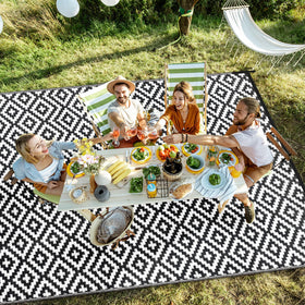 Kalafun reversible outdoor rug enables quick style changes for patios and decks.
