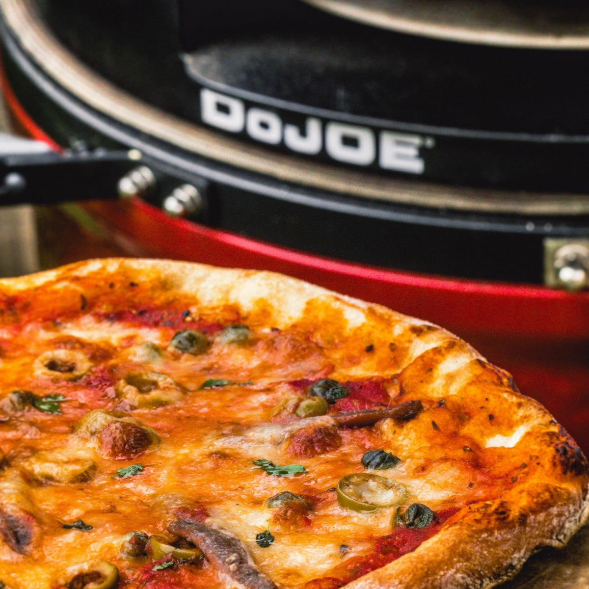 Kamado Joe DōJoe brick-oven style upgrade enhances backyard pizza nights