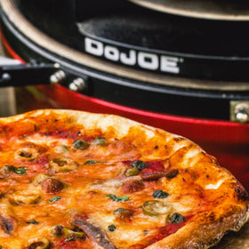Kamado Joe DōJoe brick-oven style upgrade enhances backyard pizza nights