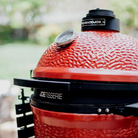 Kamado Joe JoeTisserie holds up to 50 pounds of meat for roasts and poultry