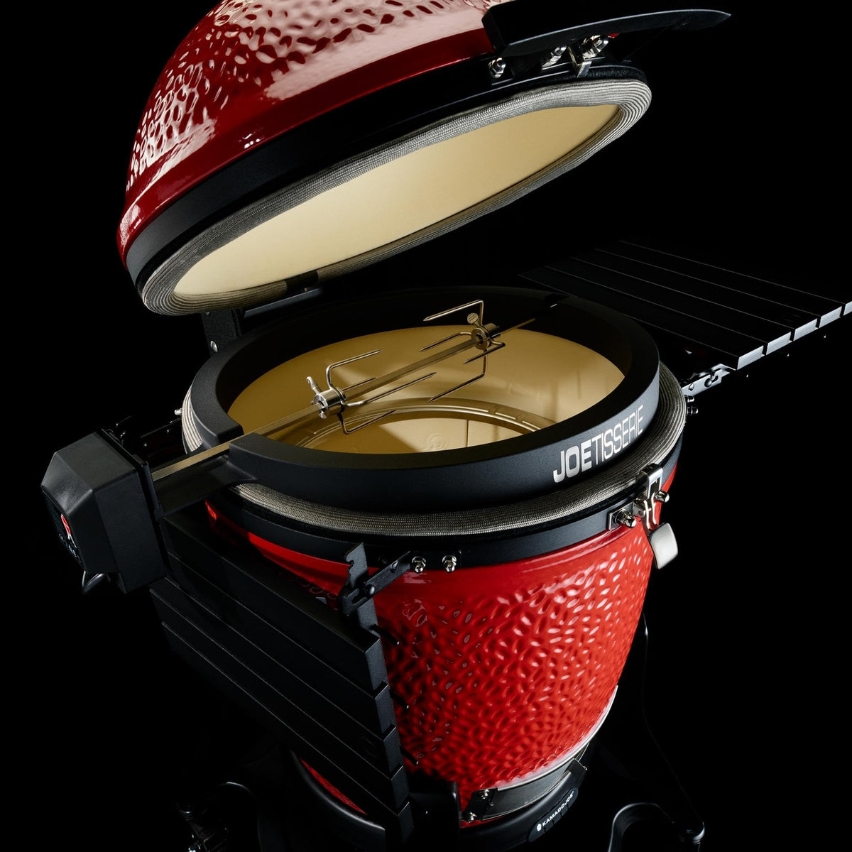 Kamado Joe JoeTisserie wedge design seals the dome for heat retention
