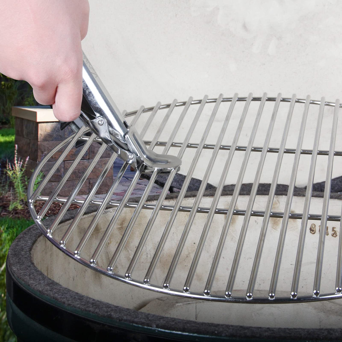 KAMaster grill grate lifter compatible with Green Egg, Weber, Primo, and more.