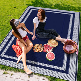 KMAT outdoor rug blue-white ideal for RV camping underfoot comfort.