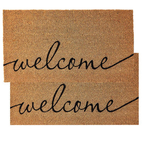 KANKUN coco coir door mat with heavy backing scrapes dirt at the doorstep