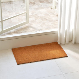 Close-up of KANKUN coco coir doormat backing demonstrates durability