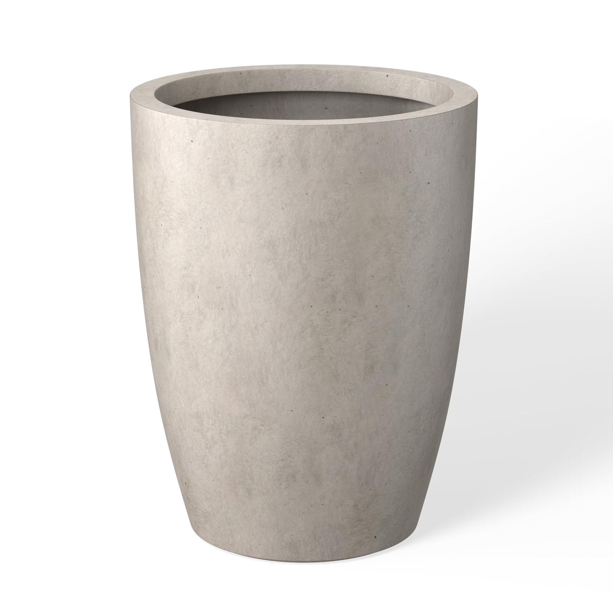 Kante 18.1in round concrete planter with pores for modern spaces.