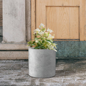Kante planter with drainage hole and rubber plug for versatility.