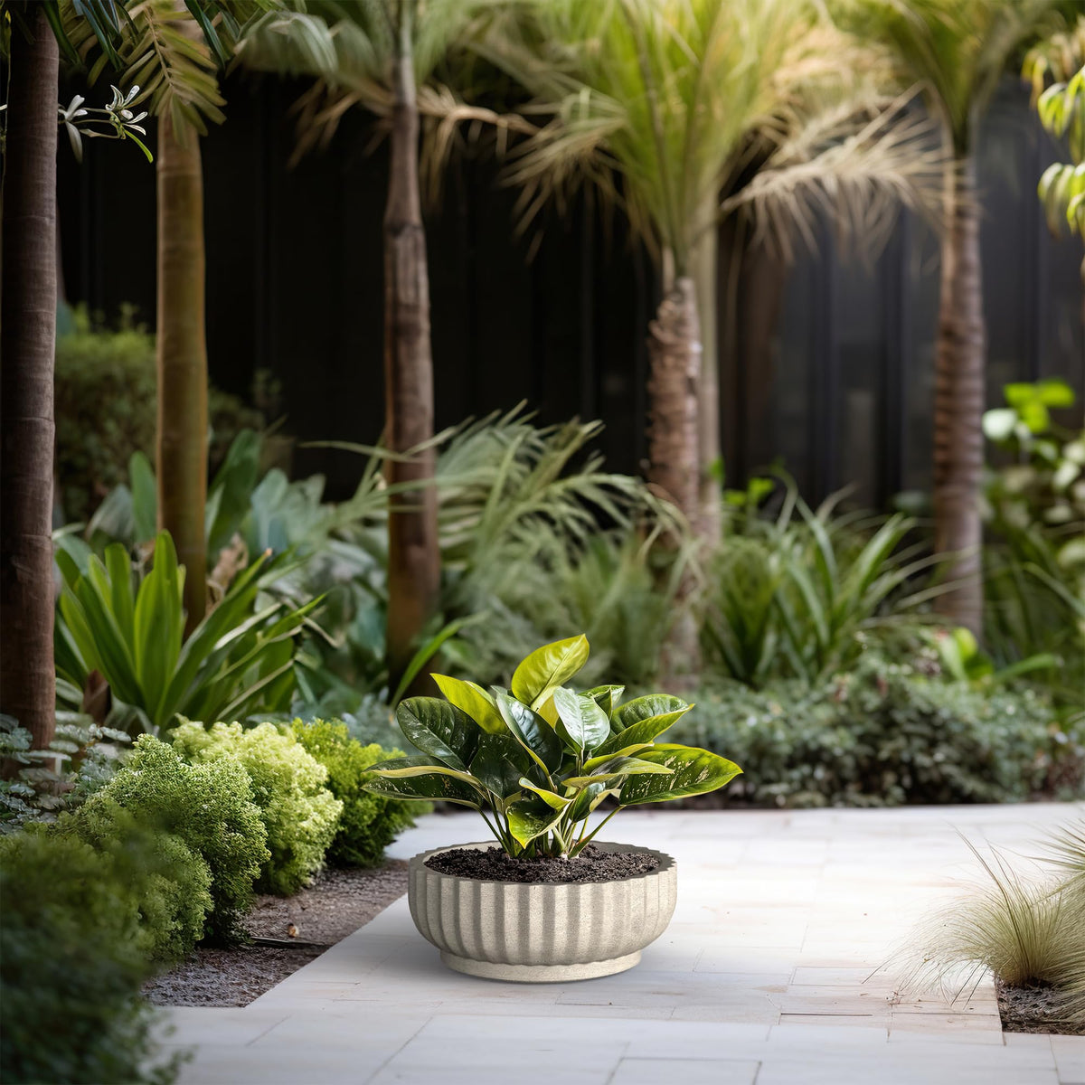 Kante planter designed for indoor and outdoor display with a sleek, durable form