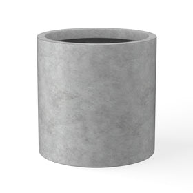 Kante round concrete planter front view showing natural texture for modern interiors.