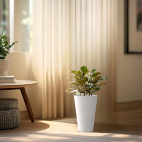 Kante planter with integrated handle enables easy inner pot removal.