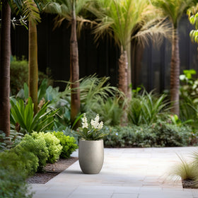 Kante weathered-concrete texture adds natural charm to garden or entryway