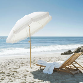 Kbrellaoutlets Patio Fringe Umbrella adjustable height for versatile setups.