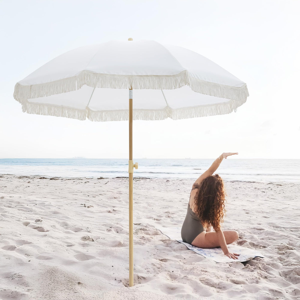 Kbrellaoutlets Patio Fringe Umbrella with UPF 50+ protection on sunny day