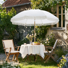 Kbrellaoutlets Patio Fringe Umbrella in garden scene demonstrates versatile use