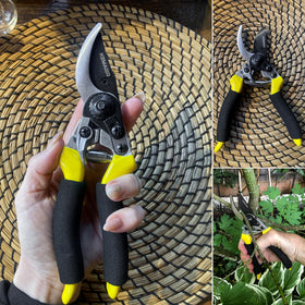 Kemaier pruning shears shown with belt holster and blade cover for safe transport.