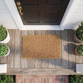 Kempf Dragon Weave doormat in entryway with natural fiber look
