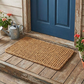 Kempf Dragon Weave doormat placed at outdoor entryway