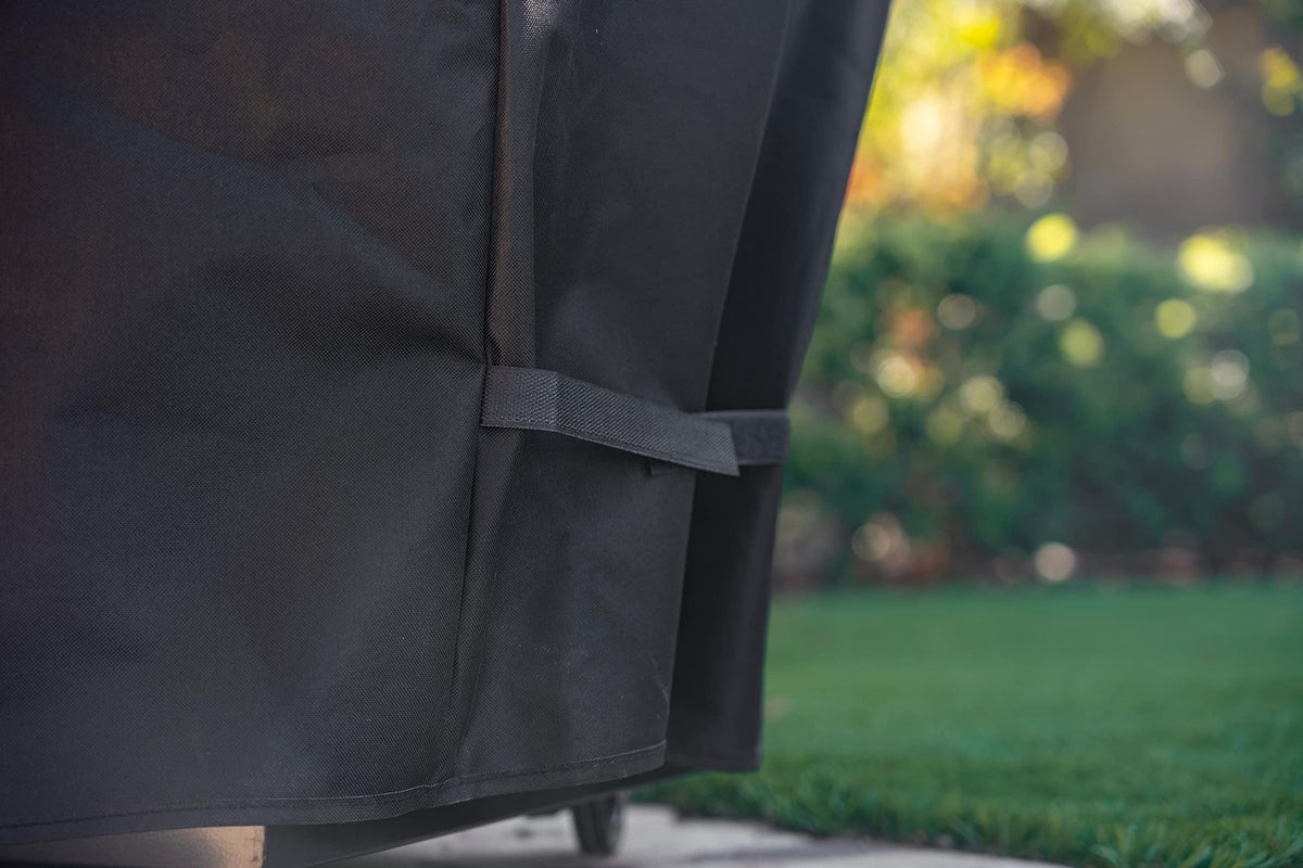 Adjustable straps keep the Kenmore cover secure on windy days.