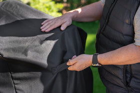 Kenmore grill cover with ventilation slots prevents moisture buildup around the grill.