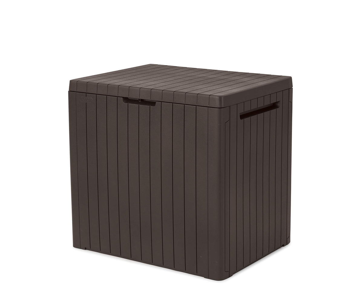 Keter City outdoor storage box with lid closed, keeping garden items dry and organized.