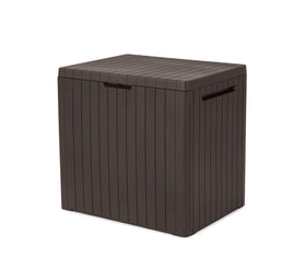 Keter City outdoor storage box with lid closed, keeping garden items dry and organized.