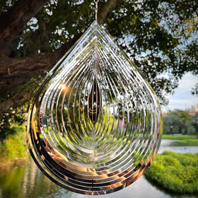 Kexsscai reflective metal wind spinner adds dynamic color as it spins.