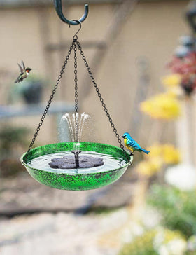 Keygift hand-painted bird bath design adds color to garden decor.