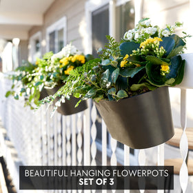 KIBAGA three-pack planters displayed on a balcony with thriving herbs.
