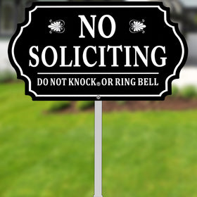 Kichwit no soliciting sign on front porch with sturdy stake
