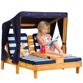 KidKraft double chaise lounge with canopy shading kids outdoors for sunny days
