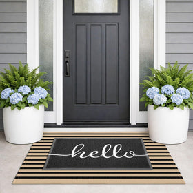 KILOCOCO striped rug brown and black weave adds chic entryway style.