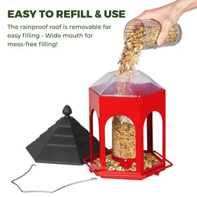 Kingsyard hanging outdoor feeder with red roof attracts cardinals.