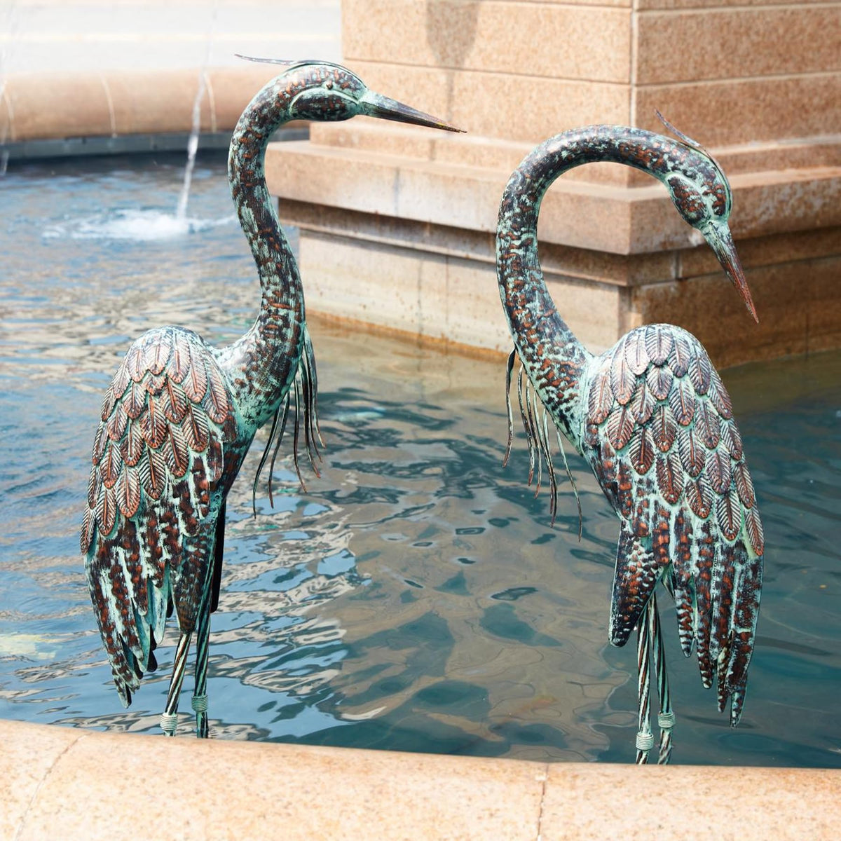 Kircust crane statue textured metal finish offers durable outdoor decor.