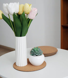 KITLAB Cork Plant Coaster used as a drying mat beside a coffee mug