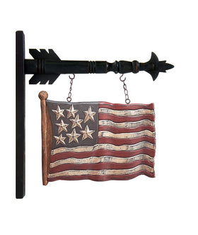 K&K Interiors carved flag arrow in red, white and blue adds seasonal wall charm