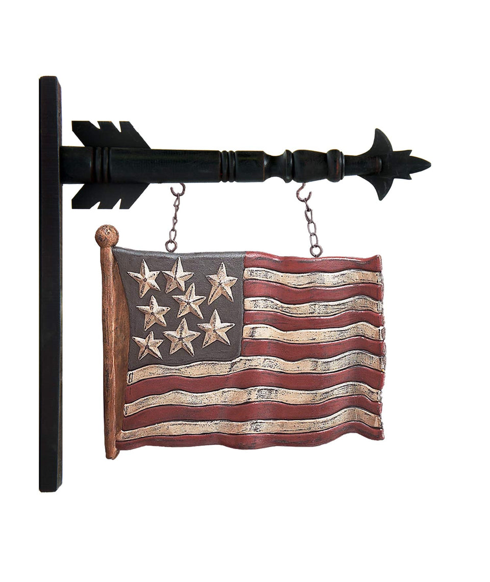 K&K Interiors carved flag arrow in red, white and blue adds seasonal wall charm